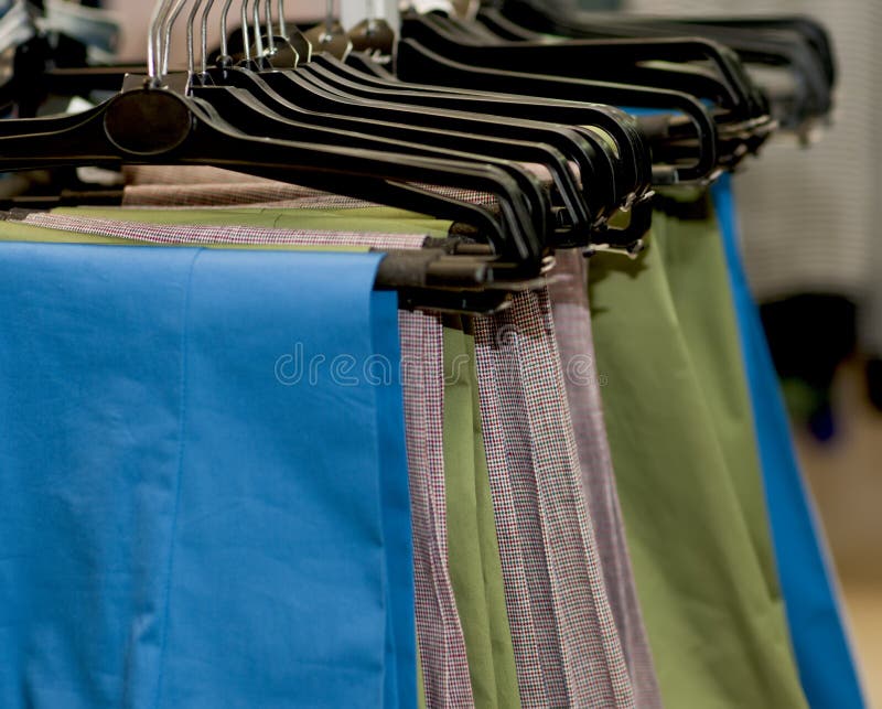 Pants on hangers. stock photo. Image of closeout, assorted 58562626