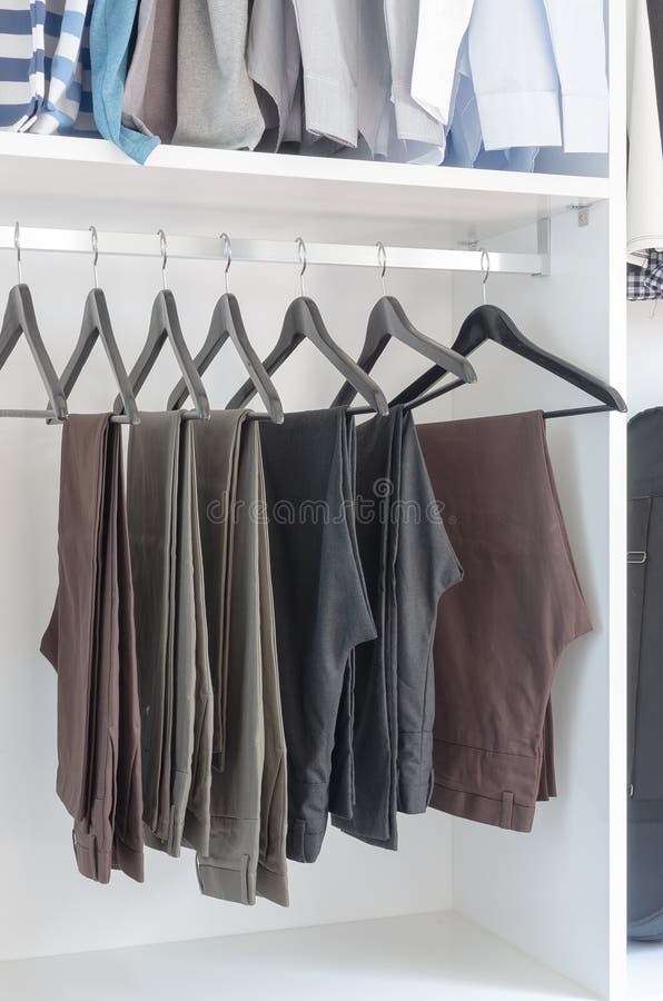 Pants Hanging on Rack in Wardrobe Stock Image Image of rack, cotton