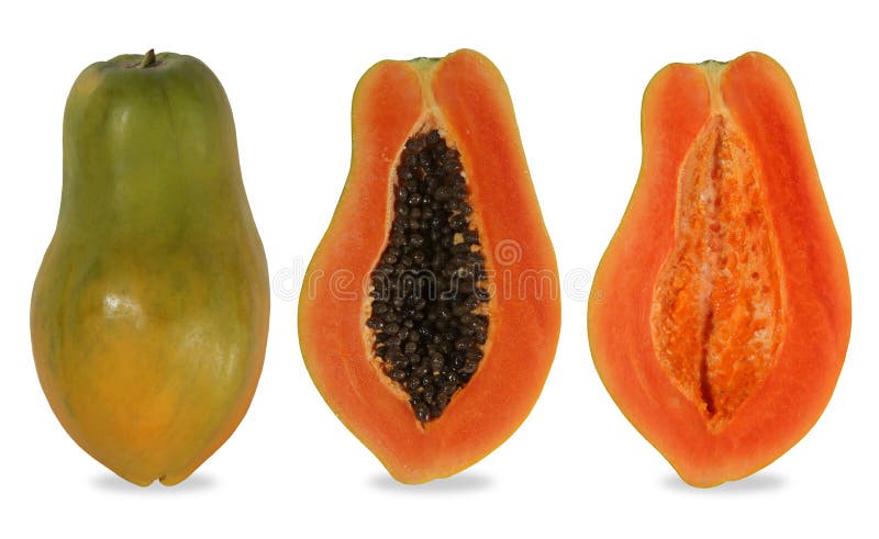 Papaya cut in the half of the cavity. Papaya is a kind of fruit. When ripe will be yellow to orange. Simply cut the papaya in the half of the cavity. The soft royalty free stock image