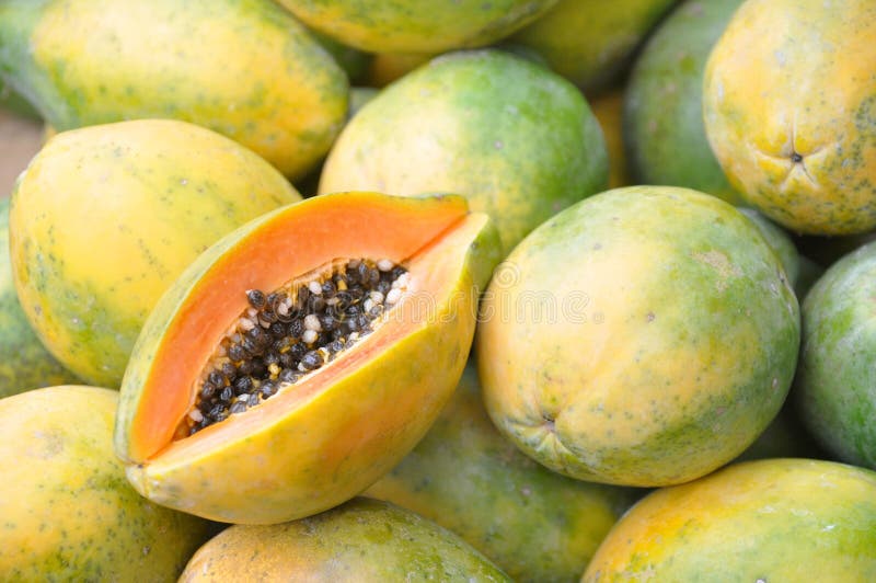Fresh Cut Juicy Papaya Mamao Fruit at Brazilian Farmers Market Stock