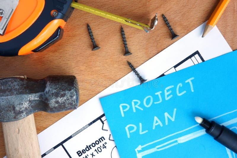 Papel azul com plano do projeto da melhoria home, jogo de ferramentas