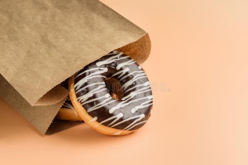Paper Bag with Chocolate Donuts Closeup Stock Image Image of donuts