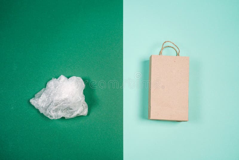 Paper bag and plastic bag stock photo. Image of litter 129446586
