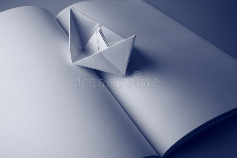 Paper boat on a book stock photo. Image of abstract, furrow 15533698