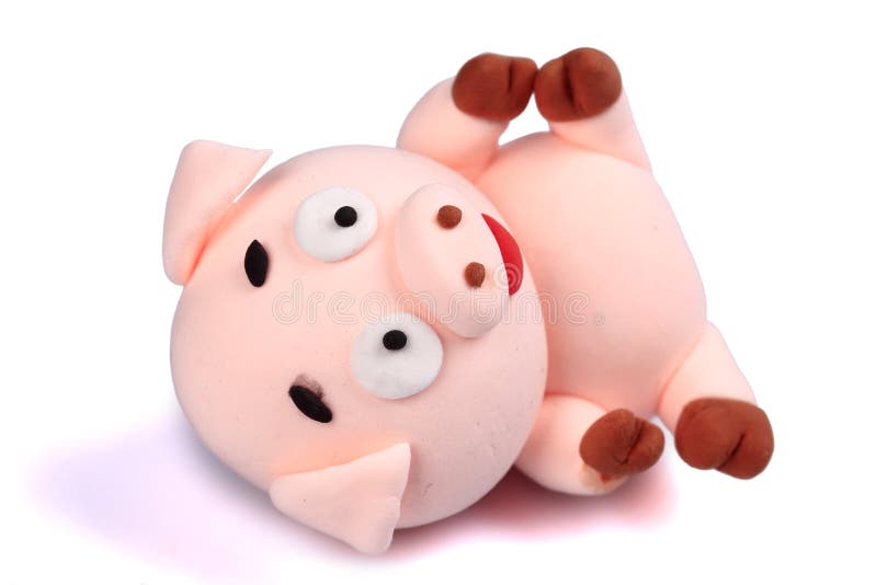 Paper clay pig on a white background