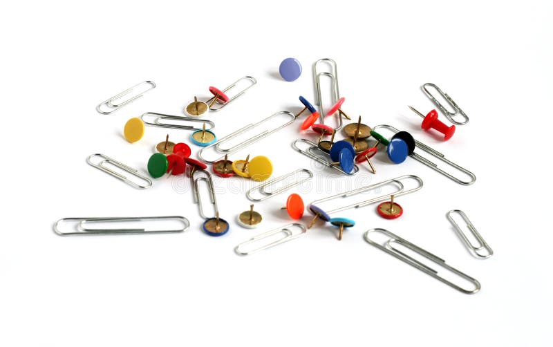 Paper clips and drawing pins many colors