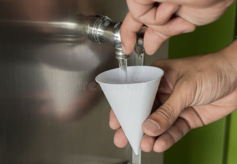 Filling A Paper Cup With Water Stock Image Image of background