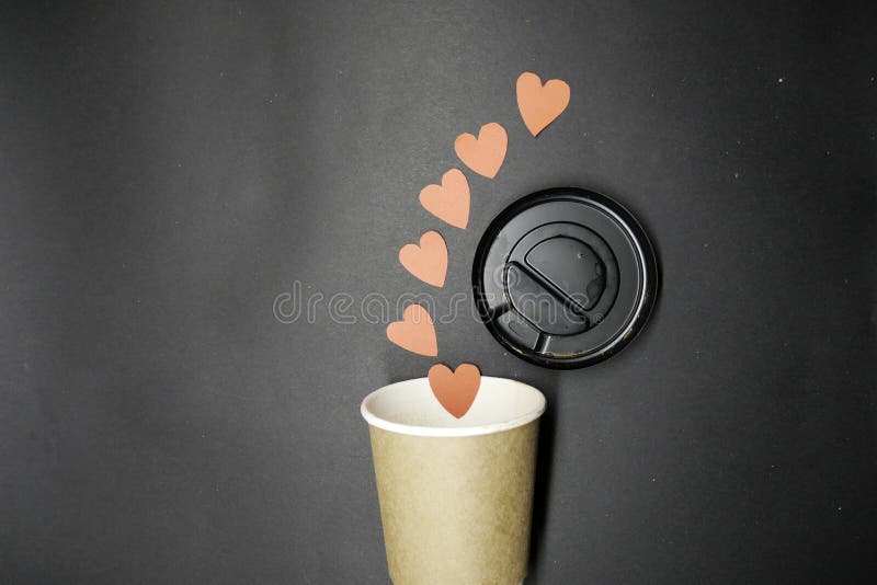 Coffee takeaway cups and red paper hearts. royalty free stock photo Coffee takeaway cups and red paper hearts. royalty free stock photo