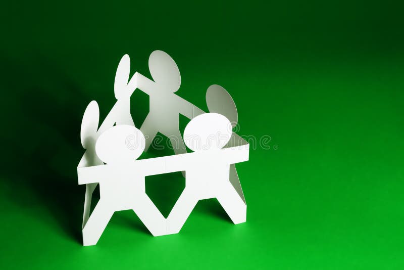 Paper Dolls holding Hands royalty free stock photo