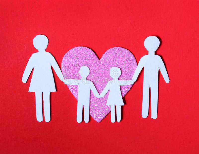 Paper Family in Pink Heart over on red background. Love, Kids and Family concept.