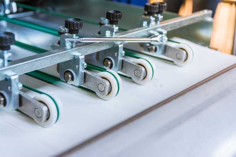 Paper Folding Machine Transfer Wheels Rollers Engineering Machinery Print Production Letter Sheet Moving Screws Adjustments Close stock photography