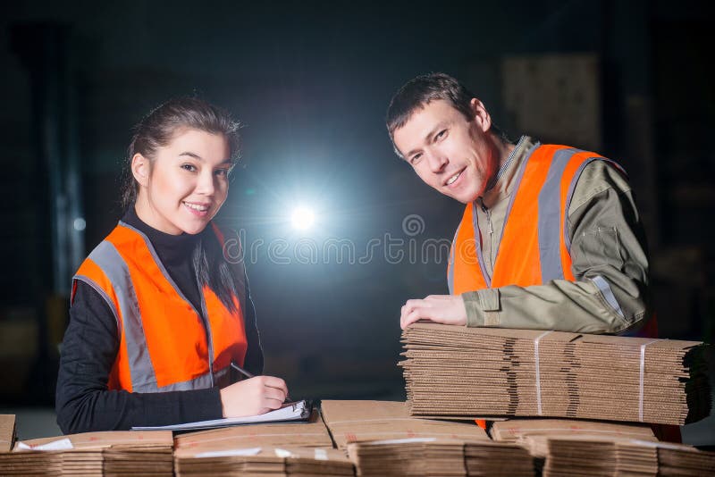 Paper mill factory workers stock image. Image of holding 79891131