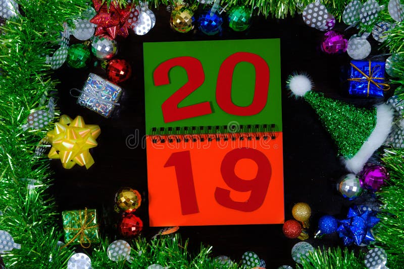 2019 on paper note in decorations background with ornaments for new year. 2019 on paper note in decorations background with ornaments for new year