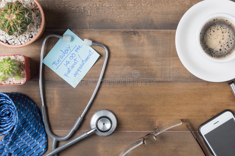 paper note patient appointment on wood blackboard wiith Stethoscope, necktie, smartphone, coffee glasses and cactus on wood royalty free stock photography paper note patient appointment on wood blackboard wiith Stethoscope, necktie, smartphone, coffee glasses and cactus on wood royalty free stock photography