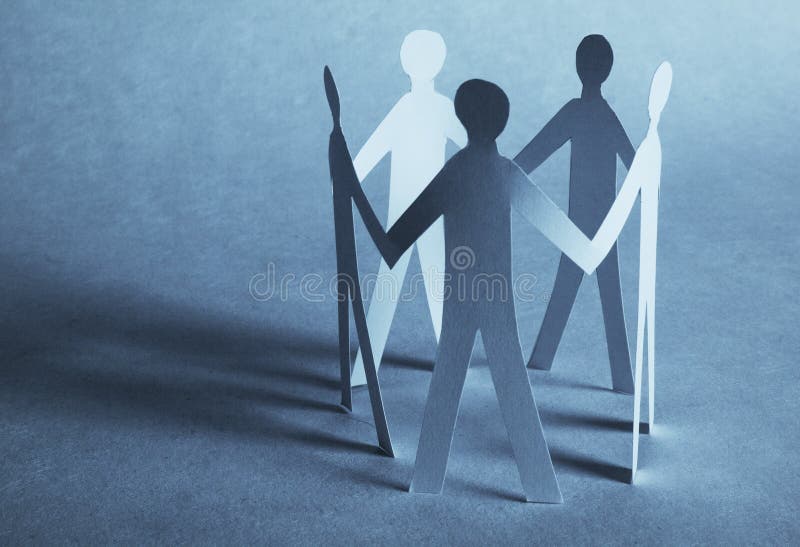 Paper people holding for hands