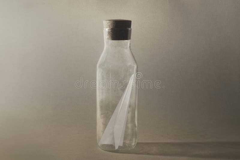 Paper plane enclosed in a bottle, need freedom to fly