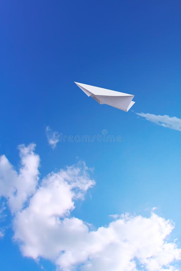 Paper plane in sky