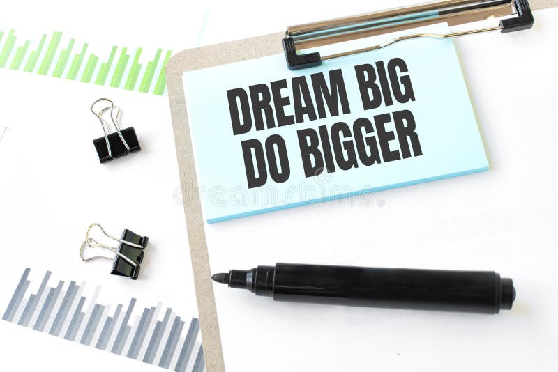 Paper Plate,marker, Diagram,chart and Office Tools. Text DREAM BIG DO