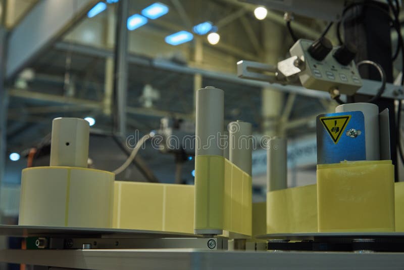 Paper ribbon feeder for label printing royalty free stock photo Paper ribbon feeder for label printing royalty free stock photo