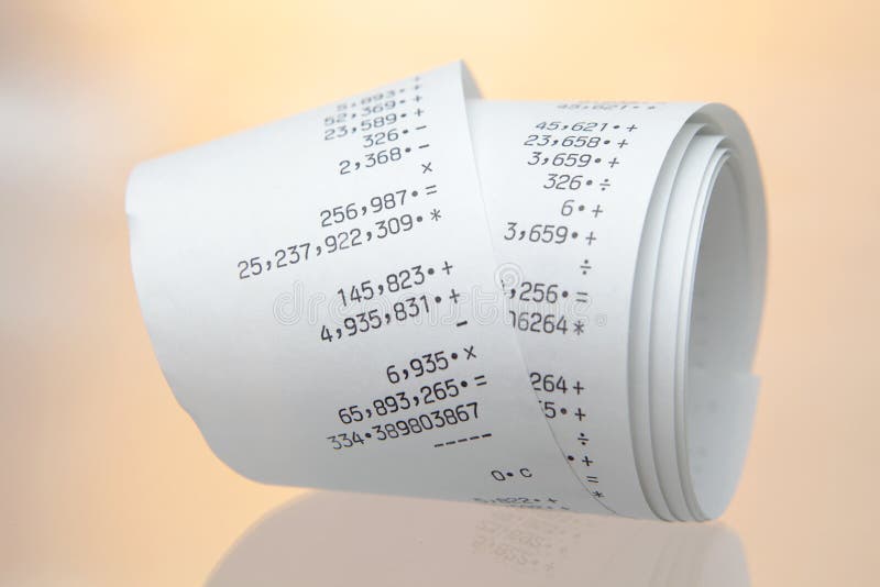 Paper roll of a desk-top calculator stock images