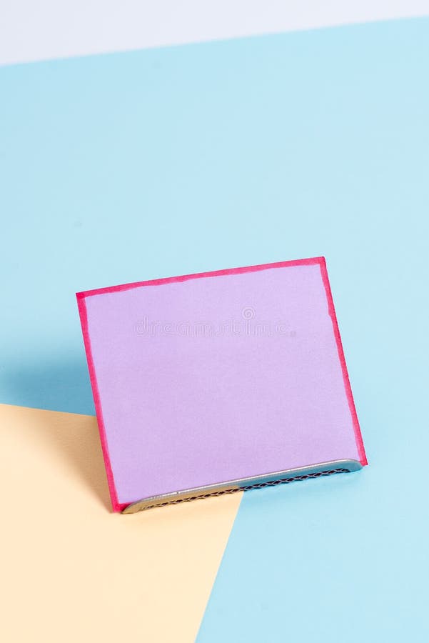 Paper Sheet Placed Tilted on a Buffer Wire with a Soft Pastel Backdrop
