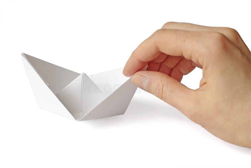 Paper ship in a hand