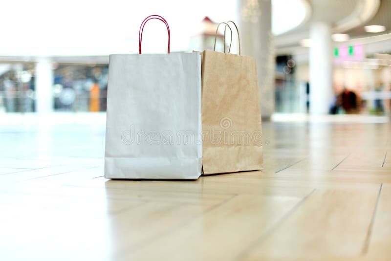 Paper Shopping Bags on Floor at the Mall. Stock Image Image of