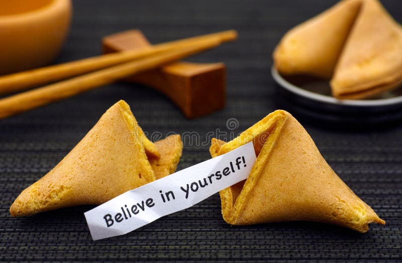 Paper strip with phrase Believe in yourself from fortune cookie royalty free stock photo