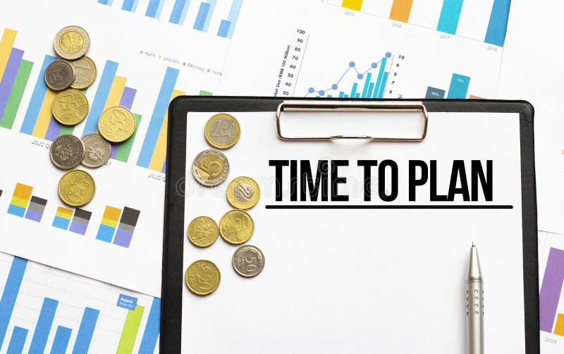 Paper with text TIME TO PLAN on the office table. Money and pen royalty free stock photography