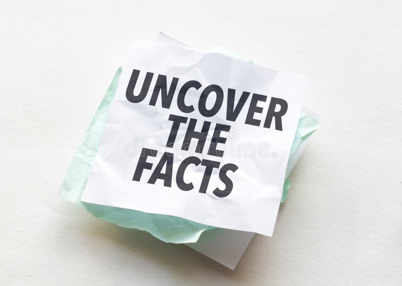 Paper with Text Uncover the Facts on White Background Stock Photo