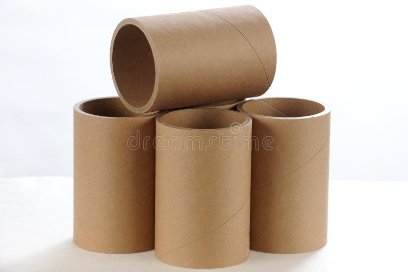 A selection of cardboard toilet paper tubes in various arrangements  isolated on a white background Stock Photo