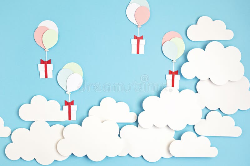 Papercut balloons and Gift Box floating in blue sky with clouds. Happy Bithday, Merry Christmas festive poster