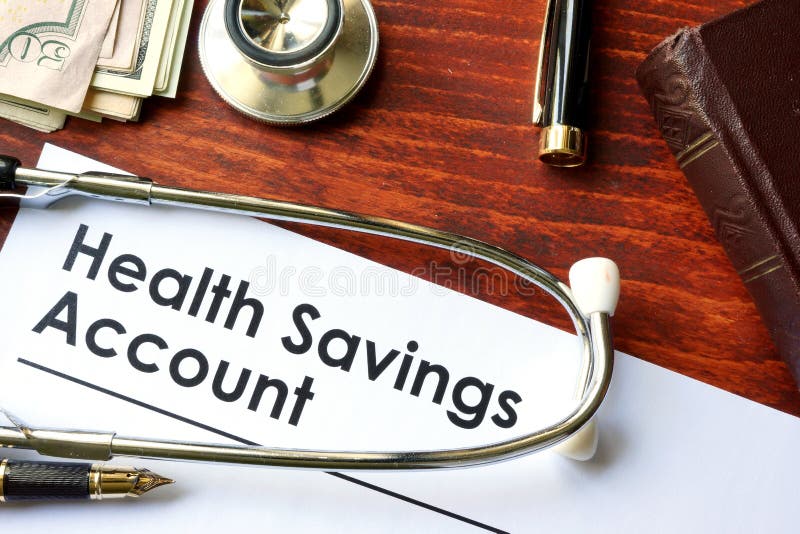 Papers with Health Savings Account HSA. On a table stock photo