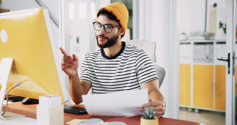 Paperwork, designer or creative man on computer in startup for art project, digital media or video editing. Document, script or research for content creation, post production or filmmaking process. Computer editing stock images, royalty-free photos and pictures