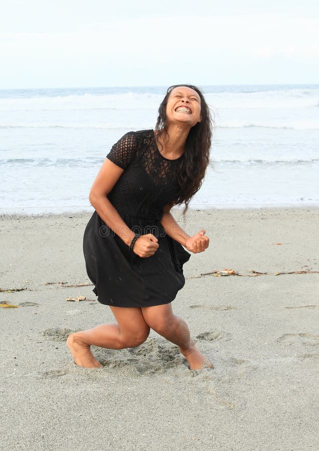 Papuan girl yelling on beach