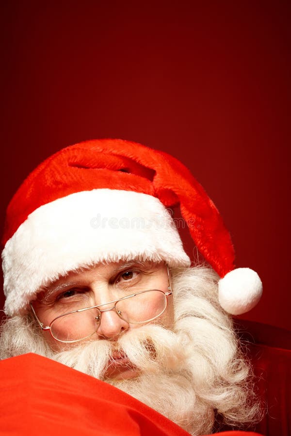Papá Noel en lentes imagen de archivo Papá Noel en lentes imagen de archivo