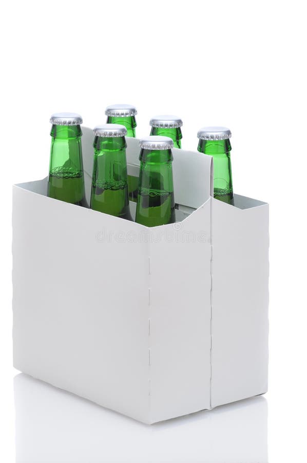 Six Pack of Green Beer Bottles in Cardboard Carrier isolated on white with reflection vertical format. Six Pack of Green Beer Bottles in Cardboard Carrier isolated on white with reflection vertical format