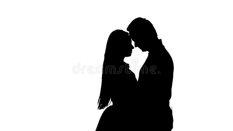 Par av att kyssa för vänner Vit bakgrund silhouette långsam rörelse långsam rörelse