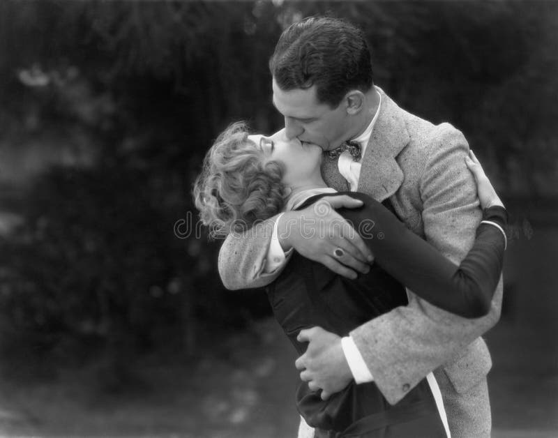 Couple kissing passionately (All persons depicted are no longer living and no estate exists. Supplier grants that there will be no model release issues.). Couple kissing passionately (All persons depicted are no longer living and no estate exists. Supplier grants that there will be no model release issues.)