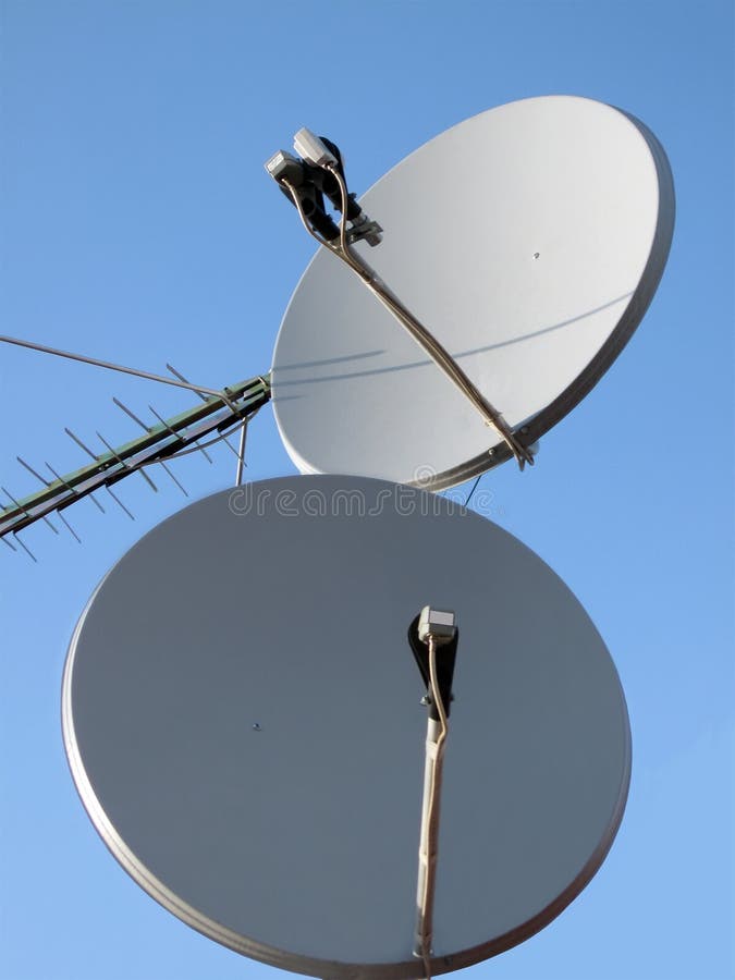 Parabolic antenna (antenne), satellite pylon, wire royalty free stock images