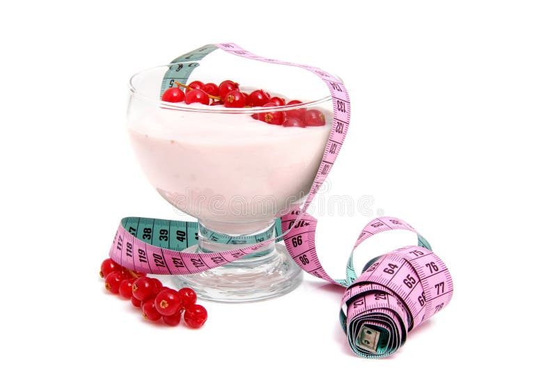 Glass bowl with yogurt,berrie fruit and measure tape for dieting over white background. Glass bowl with yogurt,berrie fruit and measure tape for dieting over white background