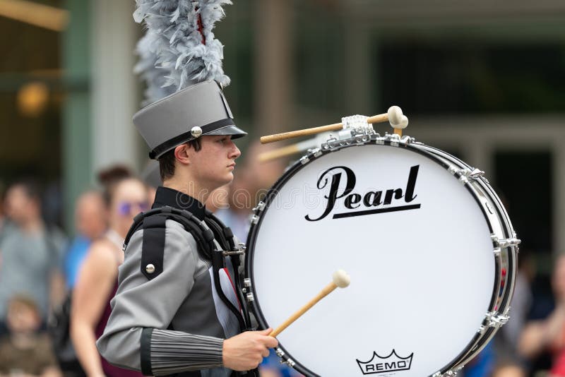 Indianapolis, Indiana, USA - May 25, 2019: Indy 500 Parade, Members of the Indiana, All - Star Marching Band, performing down Pennsylvania Street during the parade. Indianapolis, Indiana, USA - May 25, 2019: Indy 500 Parade, Members of the Indiana, All - Star Marching Band, performing down Pennsylvania Street during the parade