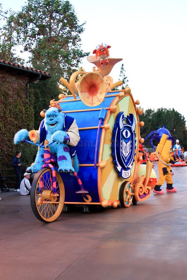 Parade float carrying characters from the Disney animated movie called Monsters, Inc., taking place at Disneyland's California Adventure park in Anaheim, California. Sully is the driver. Parade float carrying characters from the Disney animated movie called Monsters, Inc., taking place at Disneyland's California Adventure park in Anaheim, California. Sully is the driver.