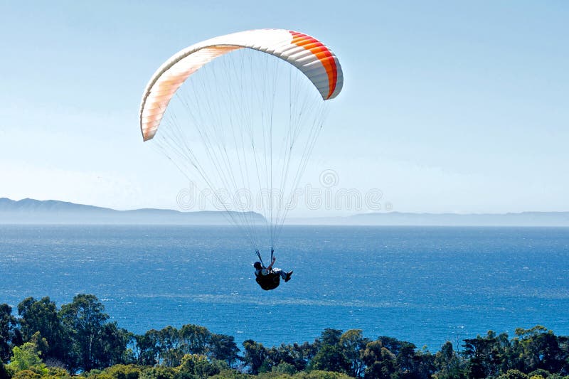 Paraglider above the Pacific Ocean