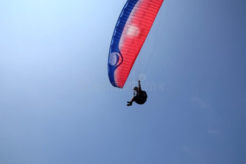 Paragliding athletes while competing in the national championship, flying from a Sikuping hill in Batang Central Java
