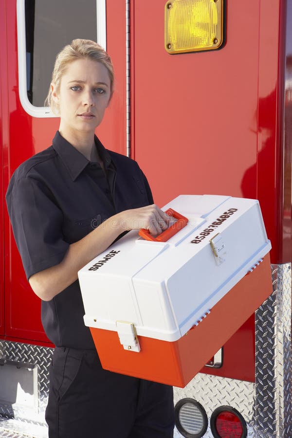 Paramedic Standing by Ambulance with Medical Kit Stock Image - Image of  holding, healthcare: 9003741
