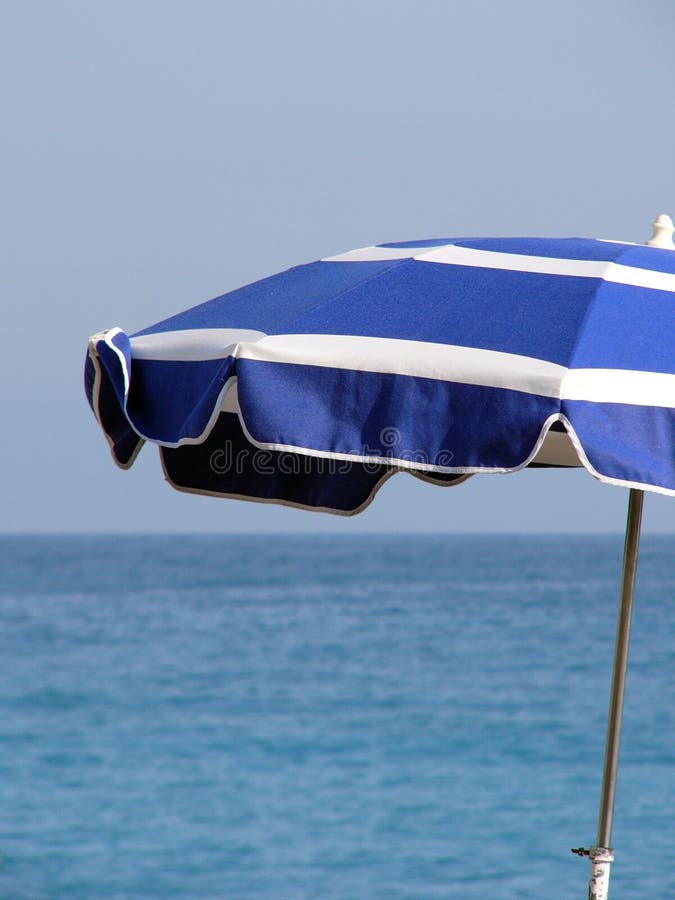 Parasol stock photo. Image of horizon, blue, stripes, parasol 130058
