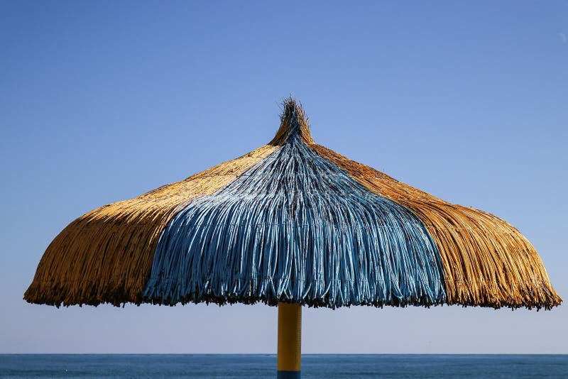 Parasol at the beach stock image. Image of leisure, beach 169247093