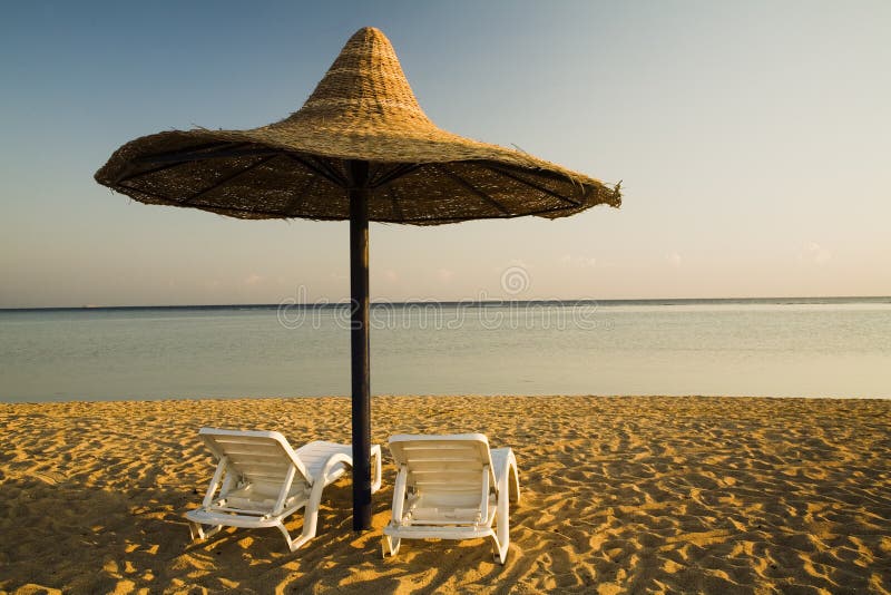 Colorful beach umbrella stock photo. Image of reserved - 17820766