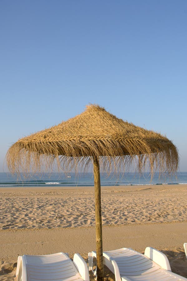 Beach chairs and umbrella. Beach chairs and umbrella